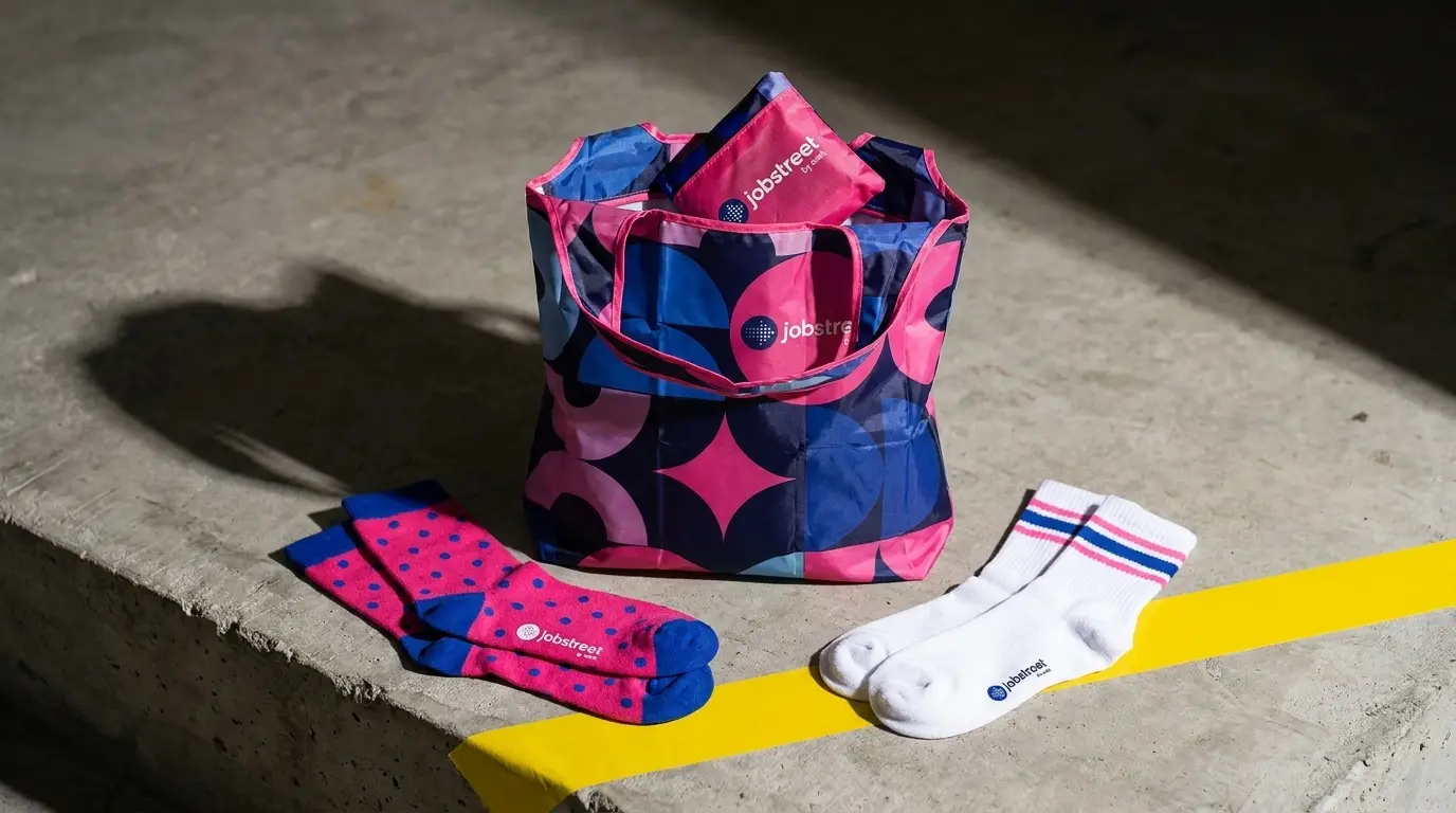 Jobstreet custom socks and foldable tote bag, original campus merchandise designed from scratch by SOS Station